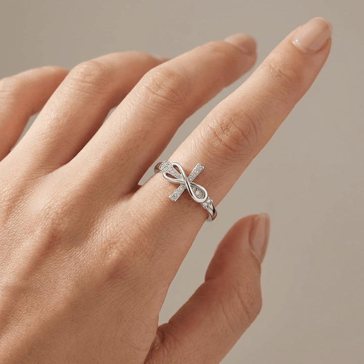 TIE &amp; CROSS SILVER RING WITH ZIRCONS - (ADJUSTABLE)